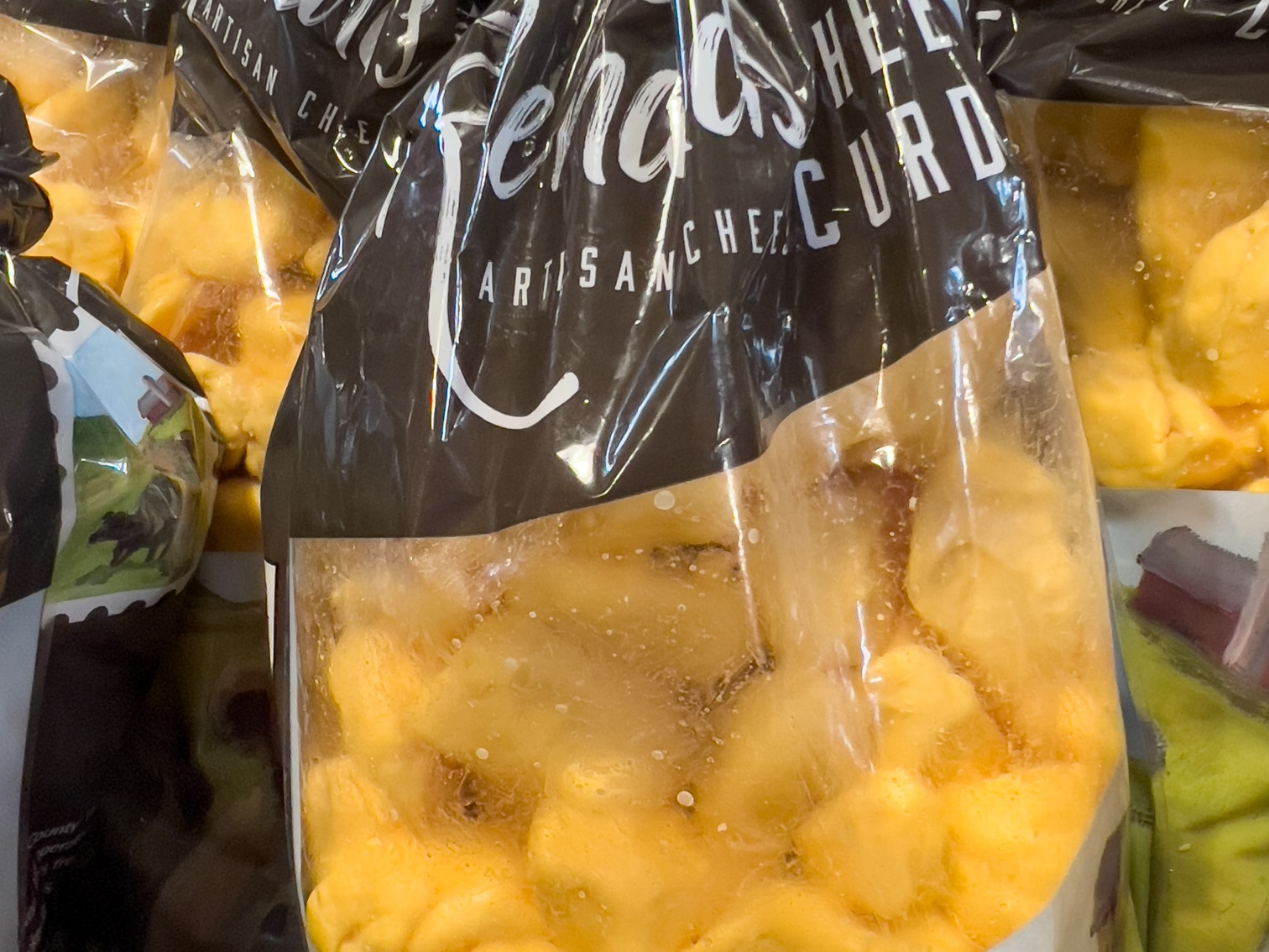 Fresh and Warm Reynard's Wisconsin Cheese Curds in a bag in Sturgeon Bay, Wisconsin