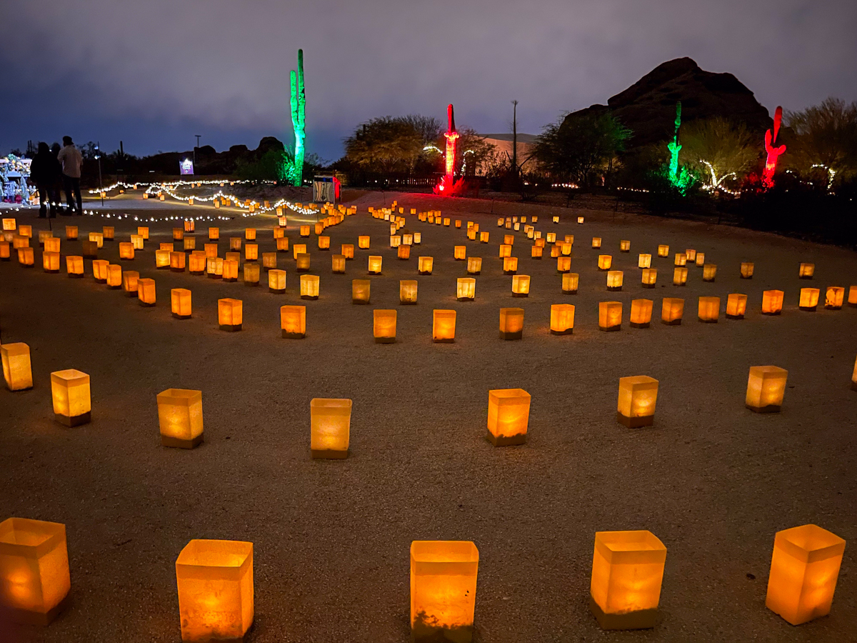 luminarias at the Desert Botanical Garden with Papago Park in background