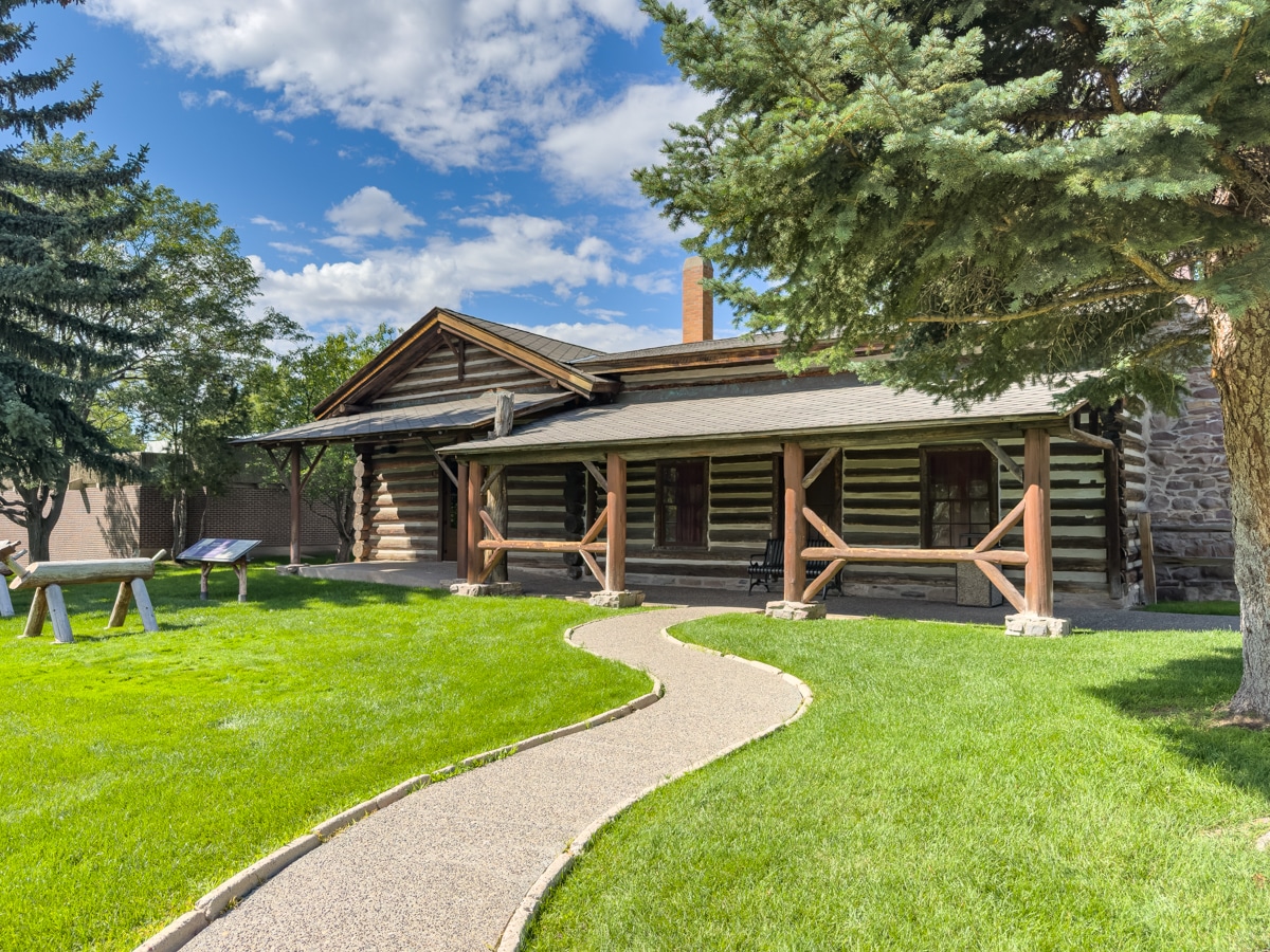 Exterior of CM Russell log cabin studio